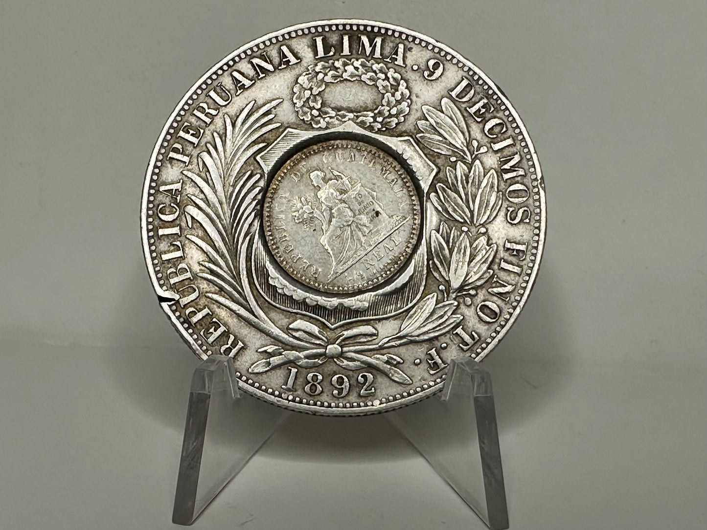 1 sol Peru 1892 con resello de Guatemala