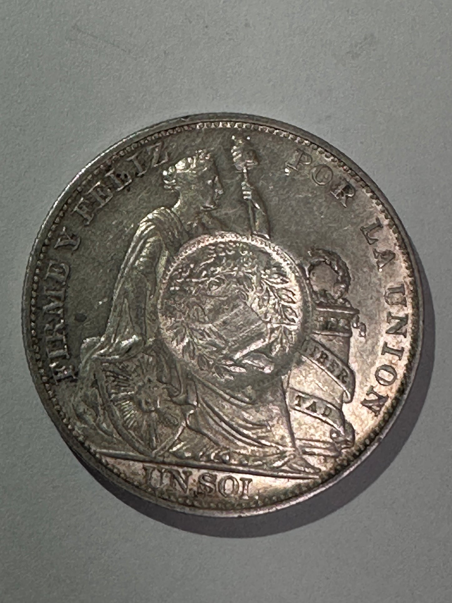 1 Sol Peru 1894 con resello de Guatemala 1/2 real 1894