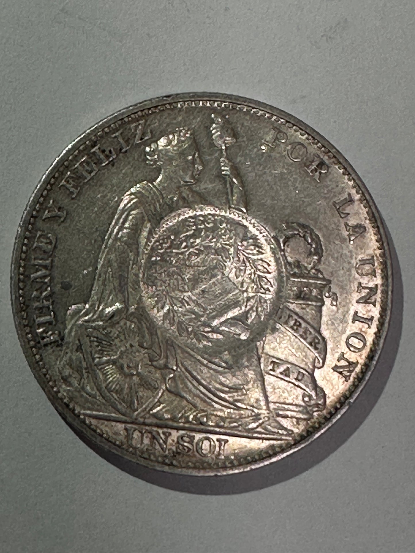 1 Sol Peru 1894 con resello de Guatemala 1/2 real 1894