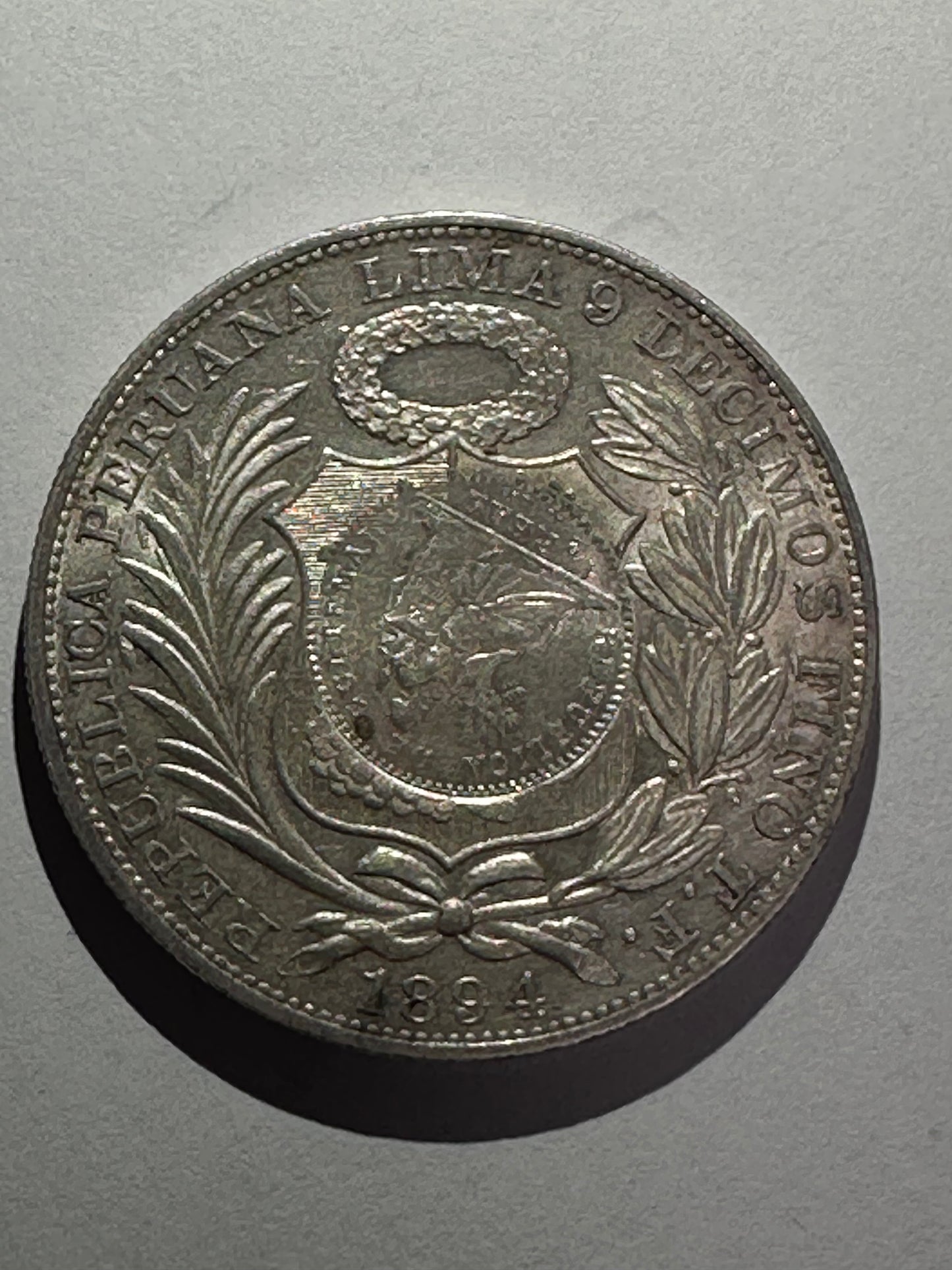 1 Sol Peru 1894 con resello de Guatemala 1/2 real 1894